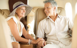 older couple traveling practicing healthy vein tips