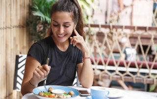 Woman eating healthy food to control her blood sugar and help her heart.