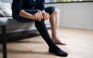 man considers non invasive treatments for varicose veins
