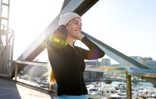 Woman getting ready to run.